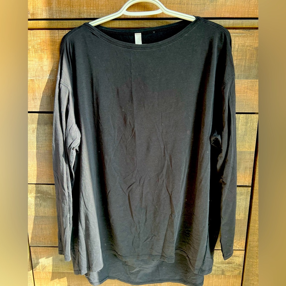 Lululemon back in action long sleeve top size 12